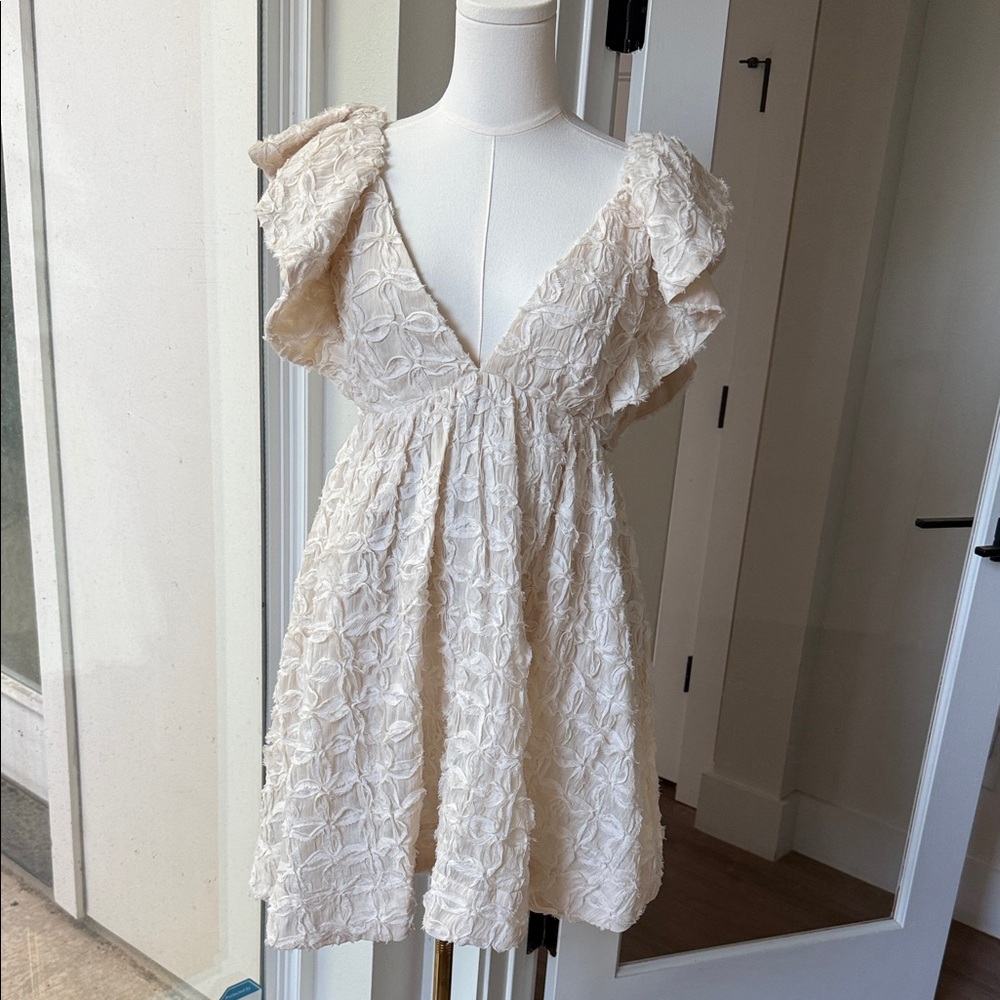 Textured Cream V-Neck Mini Dress with Flutter Sleeves